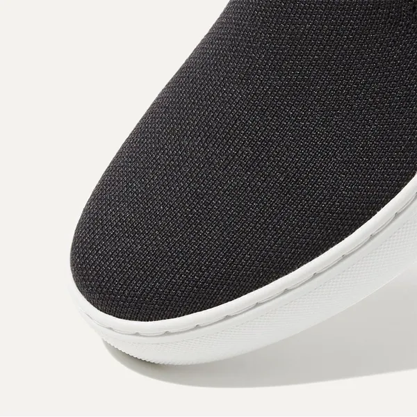 Rothy’s The Original Slip On Sneaker in Black Solid - Image 3