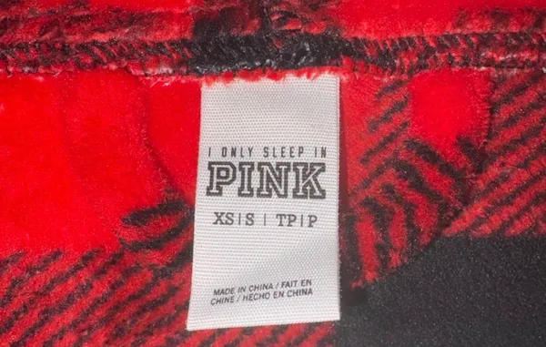 red and black buffalo plaid plush hooded robe from Victoria's Secret PINK featuring a large silver sequin dog logo on the back - Image 4