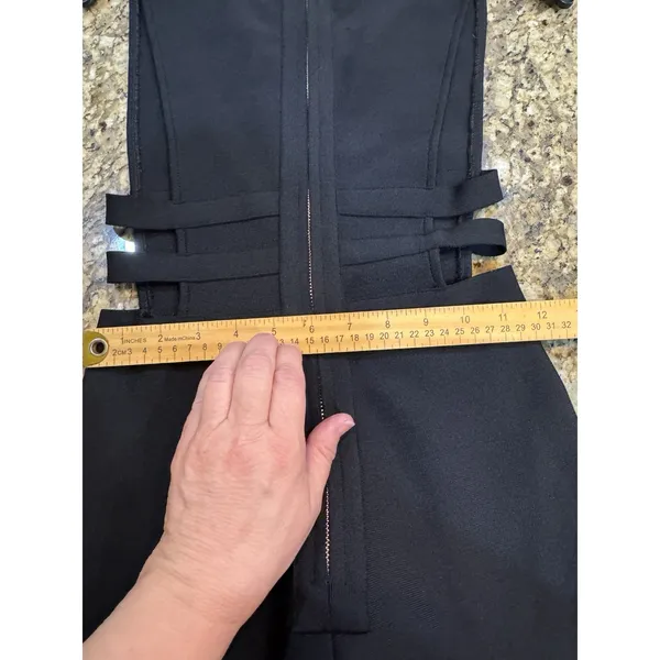 Tiger Mist black jumpsuit featuring a deep plunging neckline Size Small Cutouts - Image 5