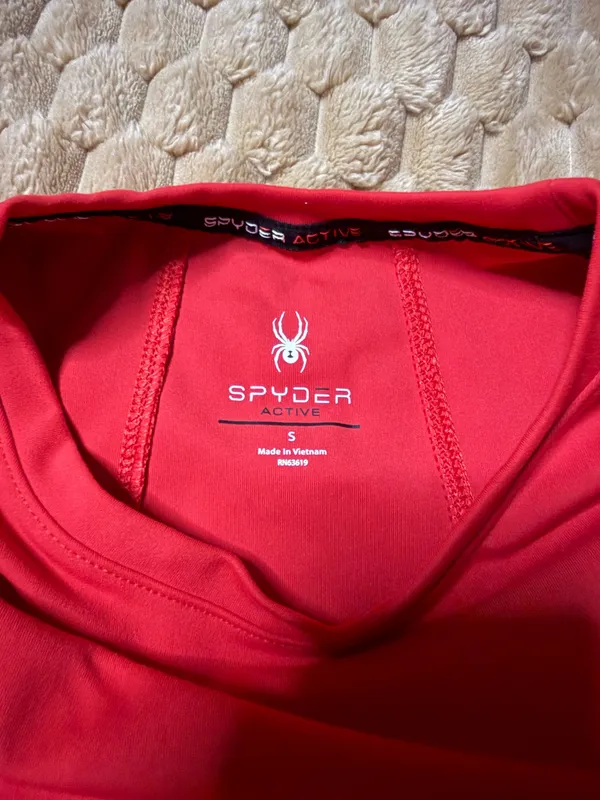 Spyder Active long sleeve shirt features mesh panels on the sides for breathability. - Image 2
