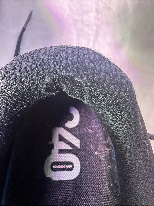 New Balance Black Sneakers with Light Blue Accents - Image 10