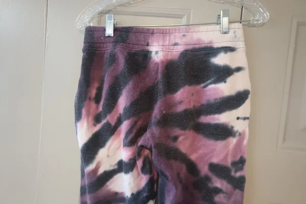 PINK Victoria's Secret tie dye sweatpant joggers outline pink on left leg in purple, black and pink size XS. - Image 9
