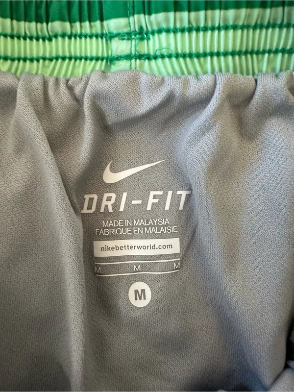 Nike Women’s Green and Pink Striped Athletic Shorts - Image 2