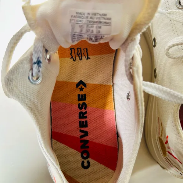 Ivory Converse sneakers with vibrant sun & rainbow side embroidery. - Image 8