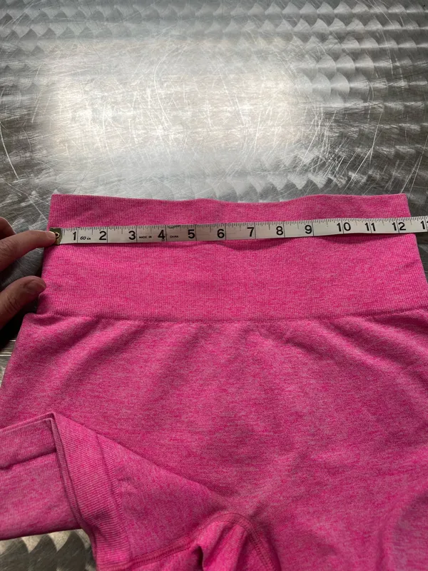 Comfortable high-waist seamless shorts in vibrant pink. Soft, stretchy fabric for unrestricted movement. Smooth waistband provides a flattering, secure fit. Ideal for workouts, yoga, or everyday wear. Size small - Image 5