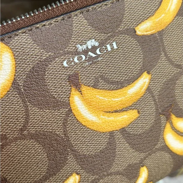 Authentic COACH Signature Coated leather BANANA zip top wristlet - Image 2