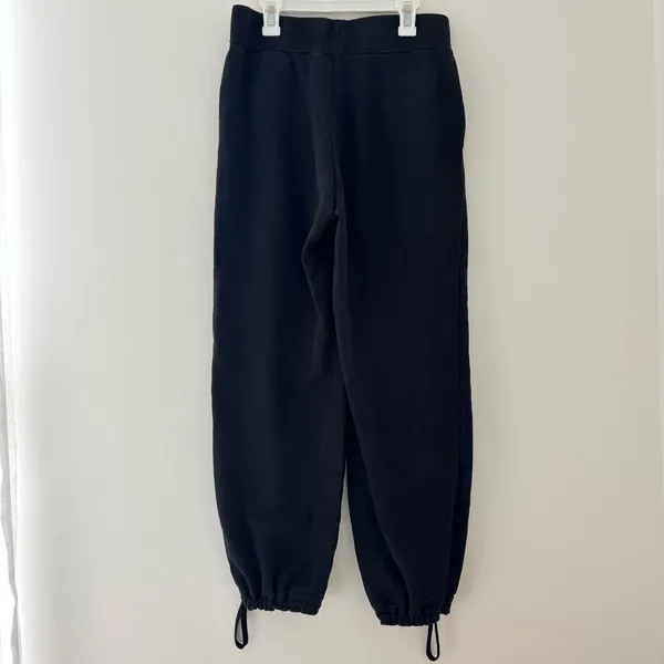 Black Nike sweatpants with drawstring waist and adjustable cuffs - Image 4