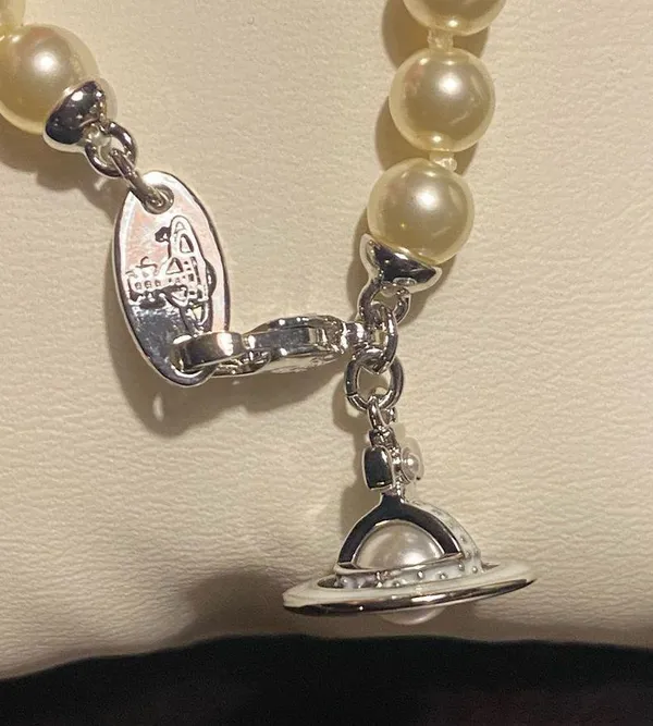 Vivienne Westwood faux pearl and Saturn orb pendant choker, new. - Image 5