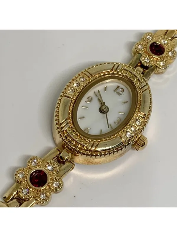 Allude gold tone women’s watch red stones 19mm floral links up to 7.5” running - Image 2