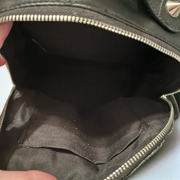 Black Glitter Faux Leather Mini Backpack with Pom-Pom Charm & Zippered Pockets - Image 12