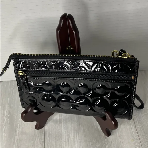Coach Black Patent Leather Wristlet with Gold Accents - Image 4