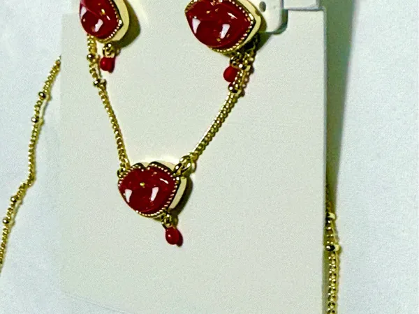 Kendra Scott red lip earrings featuring a playful vampire fang and blood drop de - Image 3