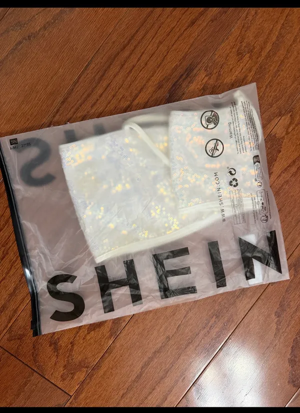 SHEIN iridescent white strappy sequin crop with bag - Size Small. Gently warn & great used condition. embellishments for a sparkly look. Measurements approximately 14.5” from armpit to armpit not fully stretched out x 6” long. Non-smoking home. priced to sell at as is condition. Don’t like my price, make reasonable offer! And thank you for checking my closet. - Image 5