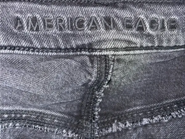 American Eagle 90s Boot Cut Distressed Black Washed Jeans - Image 4