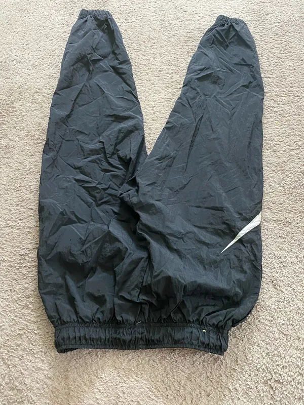 Nike Black Unisex Windbreaker Joggers with White Swoosh Accent - Image 6