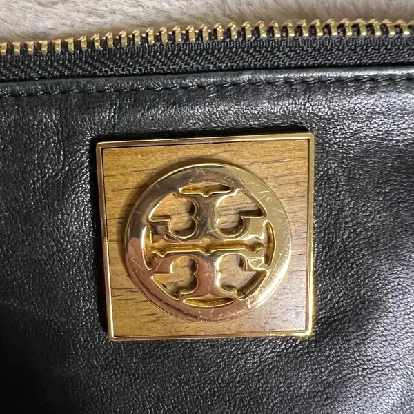 Tory Burch Black and Gold Clutch with Leather Finish and Zipper Closure - Image 2
