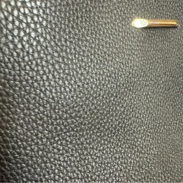 Black cross-body purse with gold detailing - Image 6