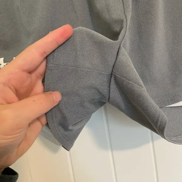 NWOT | Under Armour women’s heatgear “loose” light gray white athletic‎ shorts M - Image 3