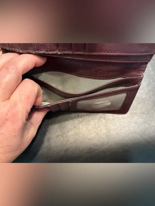 Fossil pebbled leather tab clutch wallet in a deep burgundy or berry color - Image 9