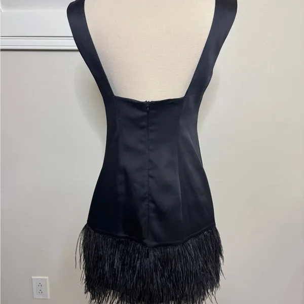 Black satin mini dress with a feathered hem - Image 2