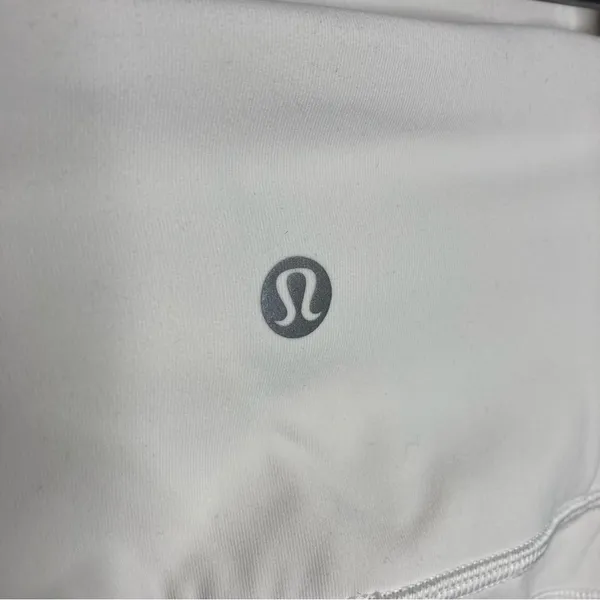 Lululemon white cropped leggings with mesh sides‎ size 2 - Image 4