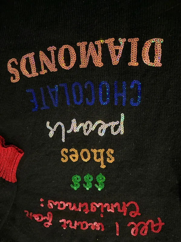 Black Christmas Sweater Dress with Festive Pom-Poms and Multicolor Sequin Text - Image 2