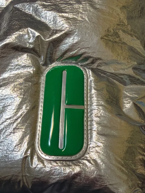 Clinique Silver Metallic Puffer Style Tote Green Interior Snap Closure NWOT - Image 2