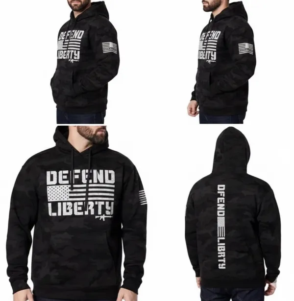 Howitzer "Defend Liberty" Black Camo Hoodie Elevate your casual wear with this rugged and patriotic Howitzer "Defend Liberty" Hoodie. Featuring a stealthy black multicam (camo) pattern, this hoodie is designed for those who value both style and a strong message of freedom. Constructed with high-quality, durable fabric, it offers a comfortable fit perfect for outdoor adventures, range days, or daily wear. Product Features: • Brand: Howitzer Manufacturing Co. • Design: Bold "DEFEND LIBERTY" distressed graphic with the American flag and an AR-15 silhouette on the front. • Back Detail: A vertical "DEFEND LIBERTY" spine graphic for a unique look from every angle. • Sleeve Detail: Features the Howitzer brand American flag patch on the sleeve. • Pattern: Modern black/dark grey camouflage. • Style: Pullover with adjustable drawstring hood and a spacious kangaroo front pocket. - Image 6