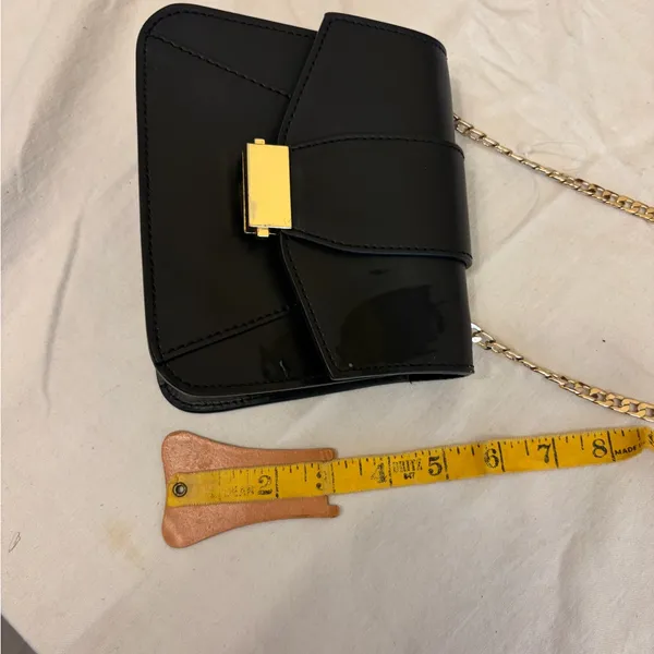 Elegant Black Leather Bag with Gold Accents - Image 14