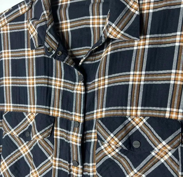 Classic Sanctuary navy plaid tunic-style button front shirt featuring a relaxed fit, chest pockets, and roll-tab sleeves for versatile styling. Lightweight and easy to wear with leggings, denim, or layered over a tank. Great casual staple for fall and transitional seasons - Image 4