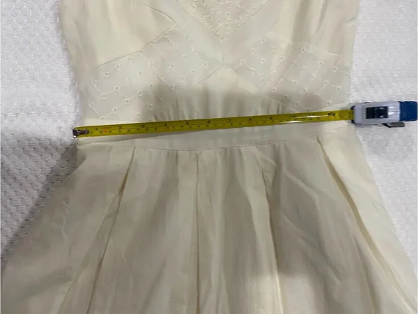 Cream Sleeveless Mini Dress with Eyelet Bodice - Image 4