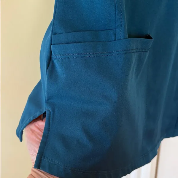 NWOT S Healing Hands Teal V-Neck Scrubs Top matching bottoms in closet - Image 3