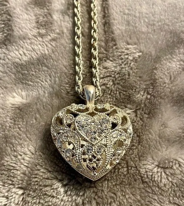 Silver colored heart locket necklace filled with rhinestones in the front side - Image 2