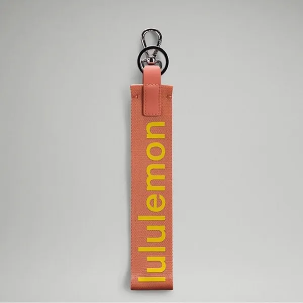 NEW & AUTHENTIC Lululemon Never Lost Keychain Pink Savannah Soliel RETIRED COLOR - Image 2