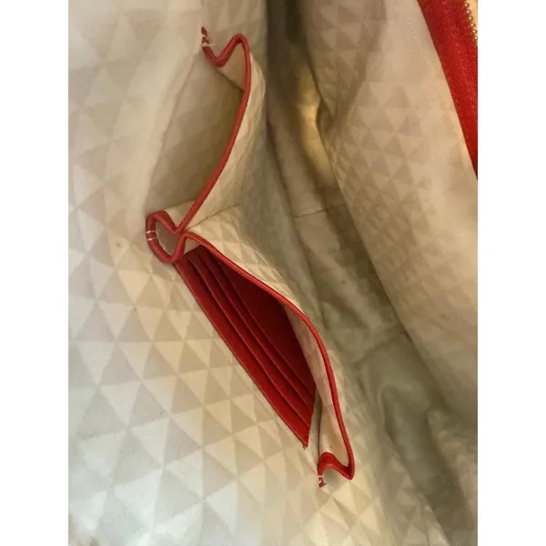 Boutique Leather Purse Red Woven Shoulder Bag Intricate Weaving Tassel Accent - Image 7