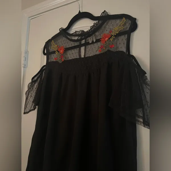 Black off the shoulder top with sheer mesh sleeves and embroidered flowers - Image 2