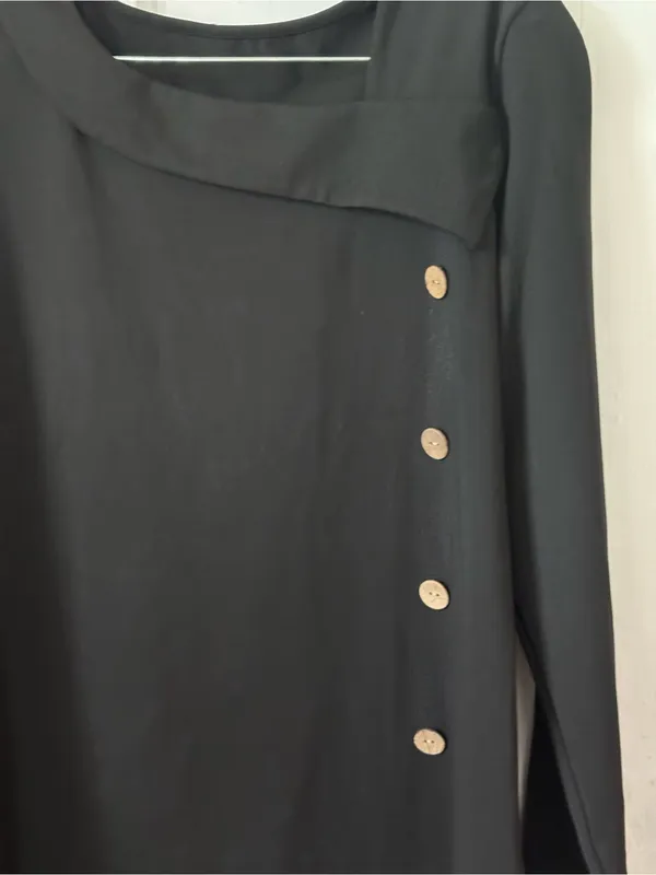 Classic Black Long-Sleeve Top with Asymmetric Button Detail - Image 2