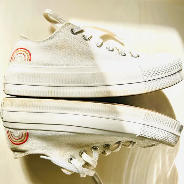 Ivory Converse sneakers with vibrant sun & rainbow side embroidery. - Image 4