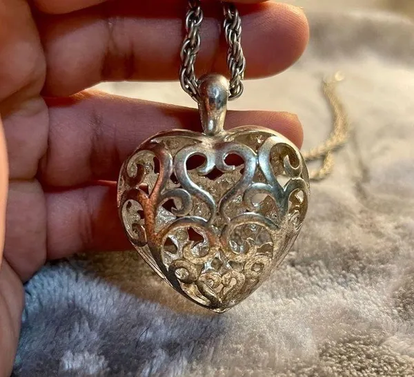 Silver colored heart locket necklace filled with rhinestones in the front side - Image 6