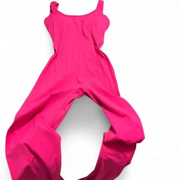 Pink flare jumpsuit with‎ stretchy fabric - Image 3