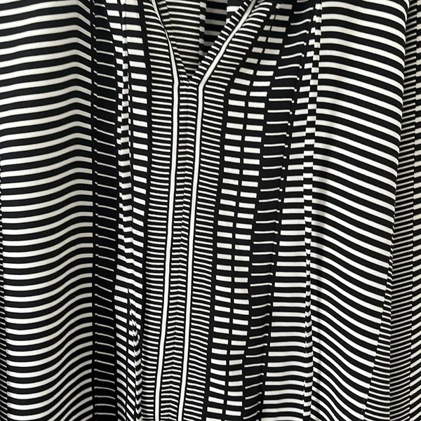 Ann Taylor multi-pattern black and white blouse in size Large - Image 4