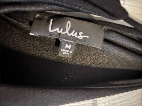 LuLu’s Classic Black High-Neck Jumpsuit - Image 3