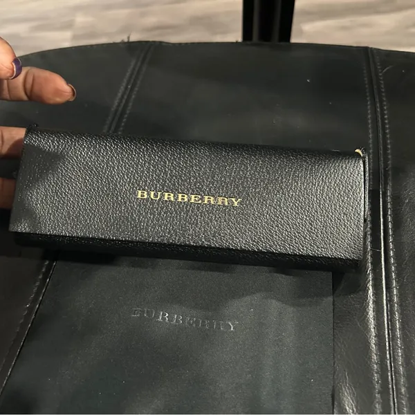 Burberry Black Case with Gold Logo includes Burberry cleaning cloth. - Image 8