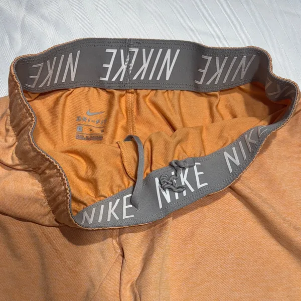 Nike Women's Light Peach Athletic Shorts with Reflective Swoosh - Image 4