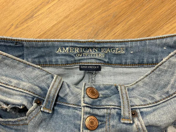 Size 4 American Eagle jean skirt with rips - Image 4