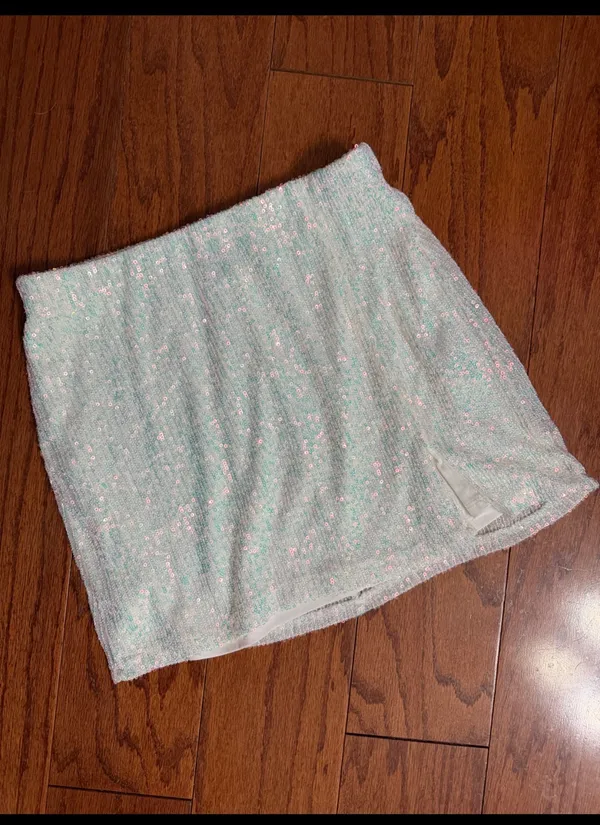 Art Class sequence white Iridescent mini skirt - size Large. ***Refer to measurements. Beautiful skirt to wear out on a party trip. Fun & spunky. Measurements approximately 13” waste x 14” long. Non- smoking home. priced to sell at as is condition. Don’t like my price, make reasonable offer! And thank you for checking my closet. - Image 2