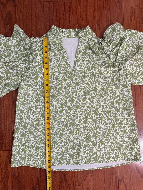 Green & white floral Boho Blouse with ruffled Puff sleeves- Size Medium. ***Refer to measurements. Gently warn and excellent condition. Measurements approximately 21” x 24” long. Material is 100% polyester. Non-smoking home . Priced at as is condition. Don’t like my price make a reasonable offer! And thank you for checking my closet! - Image 7