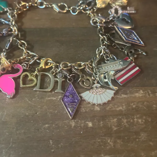 Gold tone loaded charm bracelet - Image 4