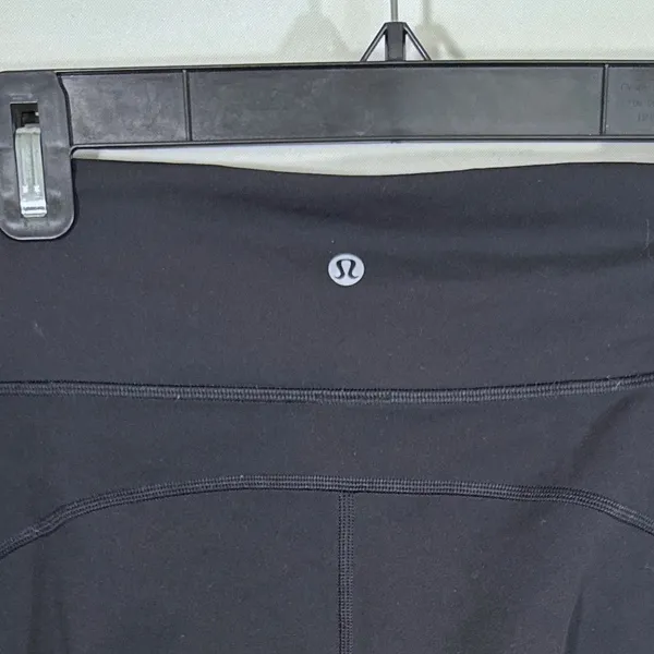 Lululemon Black Lace Up Mesh Hem High Rise 7/8 Leggings Women's Size 8 Yoga Gym - Image 4