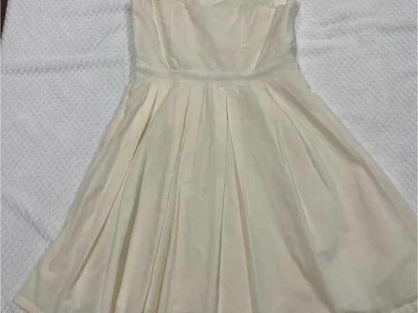 Cream Sleeveless Mini Dress with Eyelet Bodice - Image 5